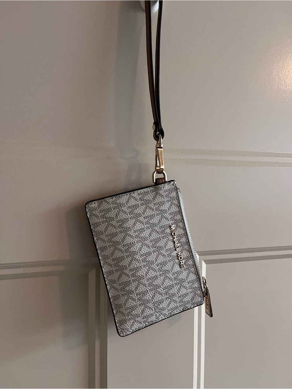 Michael Kors Silver Logo Zip Wristlet with Black Strap